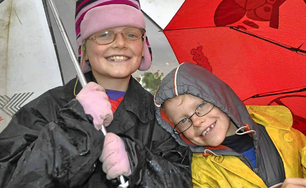 Kelly-Lea and brother Shayne Wormington were not far from their brollies at the auction. Kelly-Lea and brother Shayne Wormington were not far from their brollies at the auction.